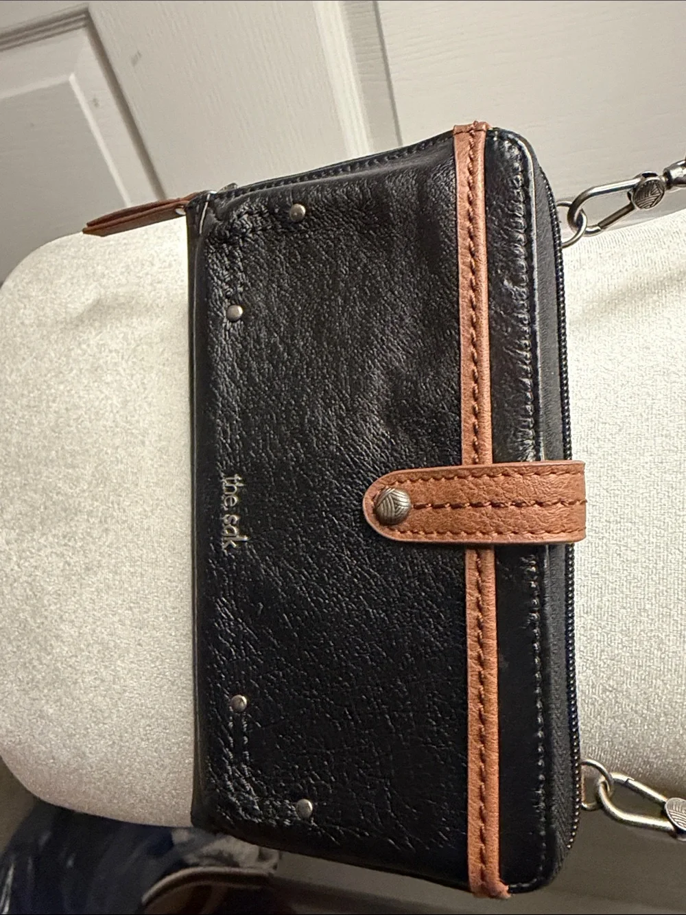 The Sak Black and Brown Leather Wristlet Wallet with Strap